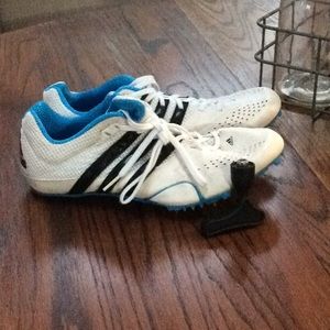 Adidas running spikes.
